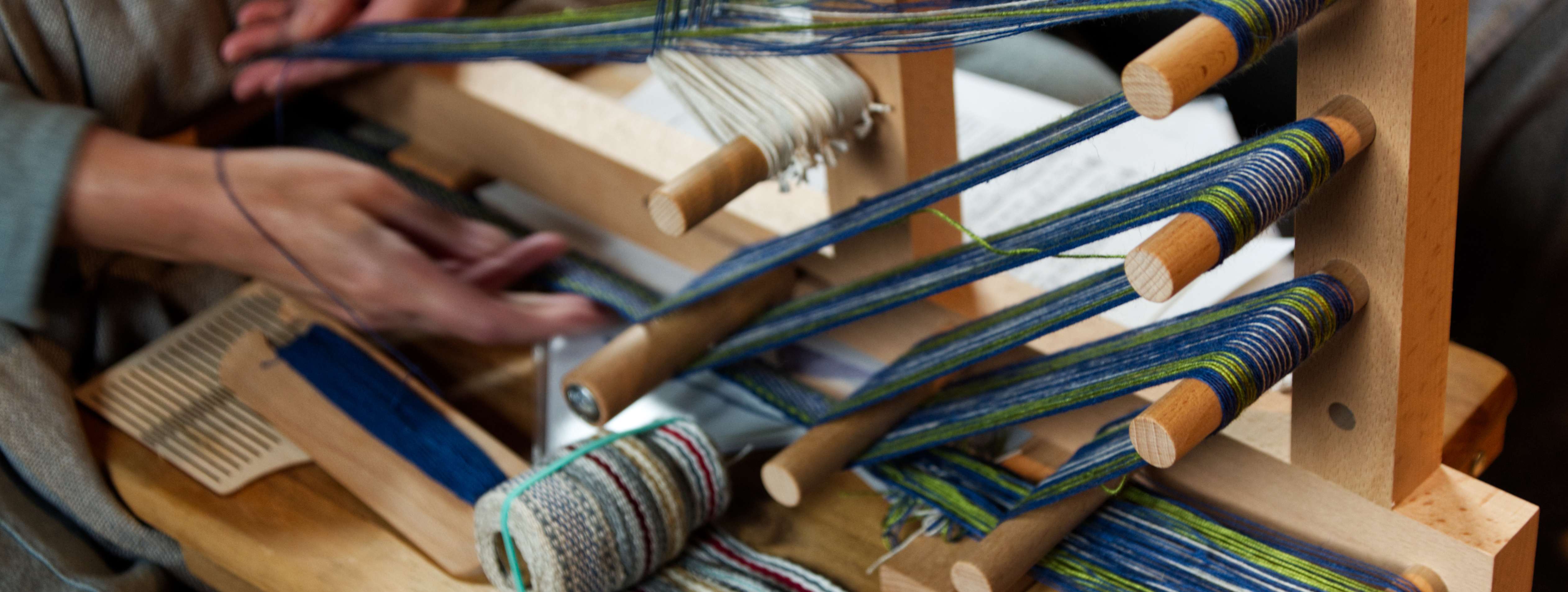 Maschine zur Herstellung gewebter Bänder