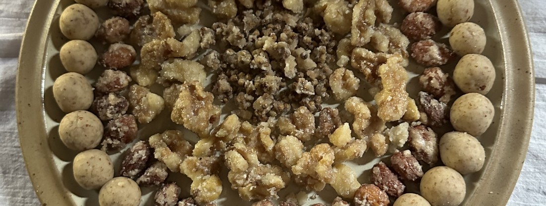 Hands knot a white woolen thread