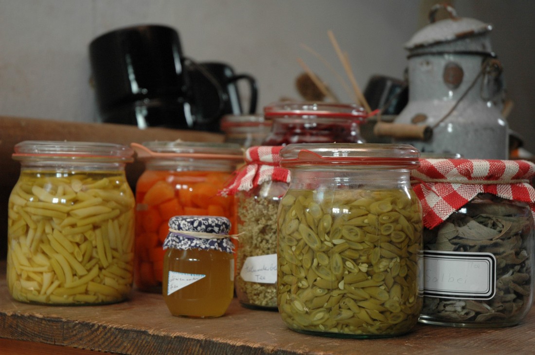 Preserving jars with beans and other vegetables